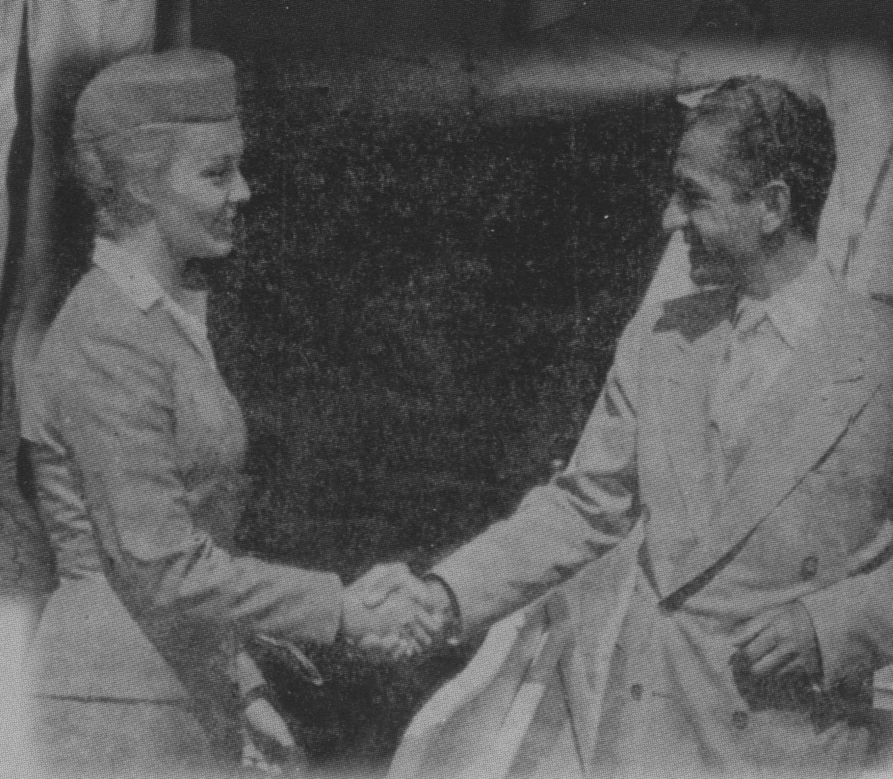 1958 Upon arrival in San Francisco from Honolulu Pan Am stewardess Ellen Forseth bids farewell to the last Shah of Iran.